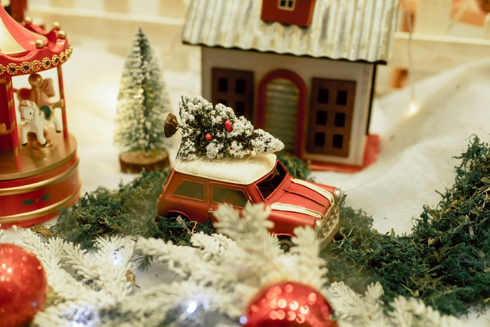 a toy car with a christmas tree on top of it